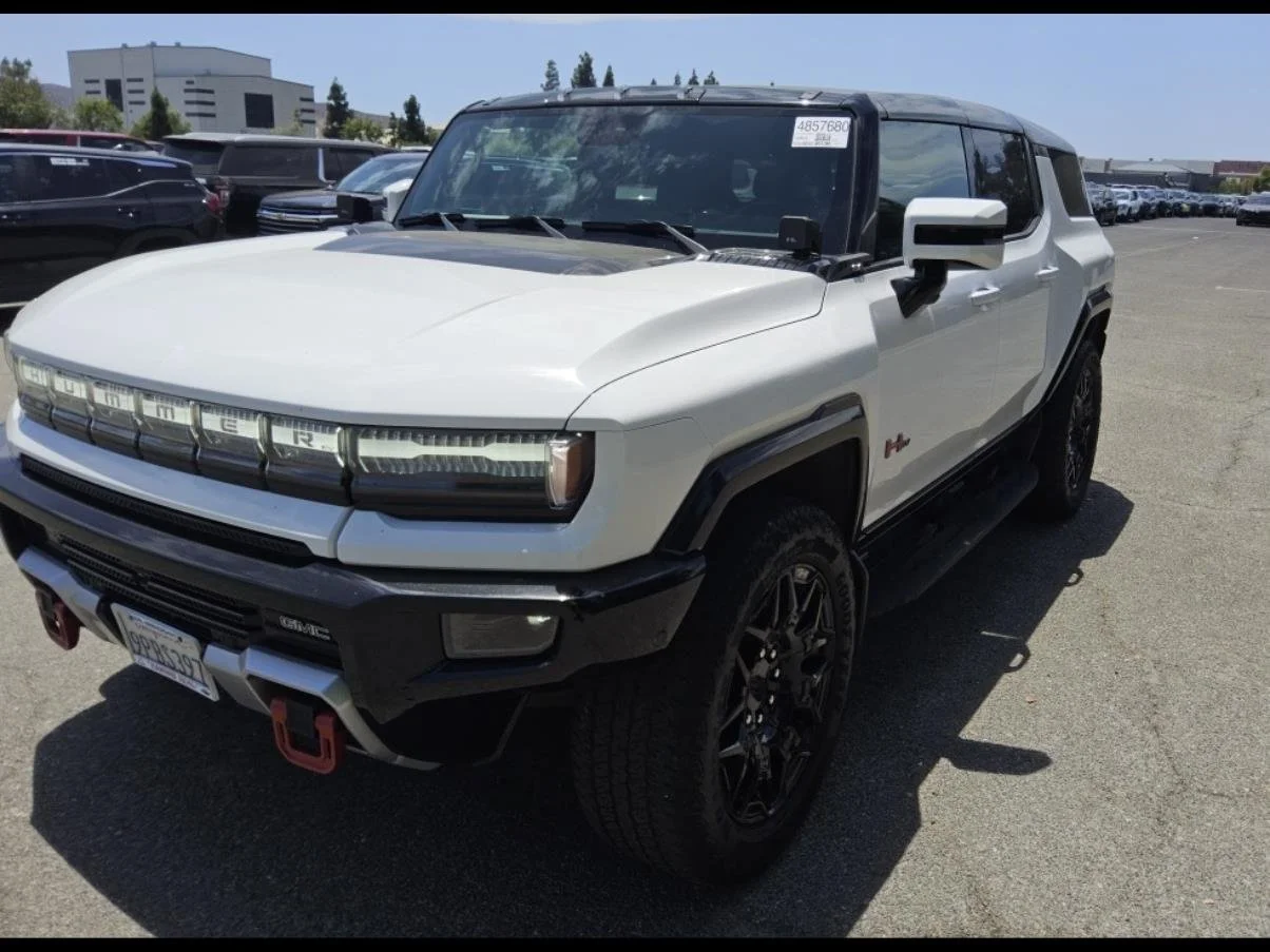 Used 2024 Interstellar White GMC 2X image 1