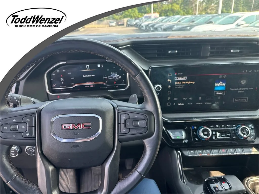 Used 2023 ONYX BLACK GMC AT4 image 1