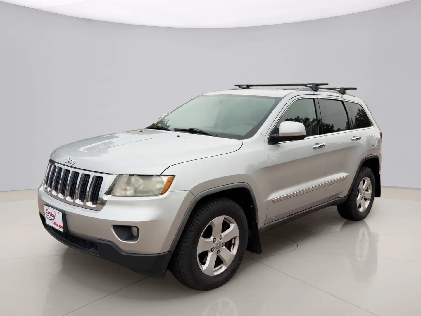 Used 2012 Gray Jeep LAREDO 4WD image 1
