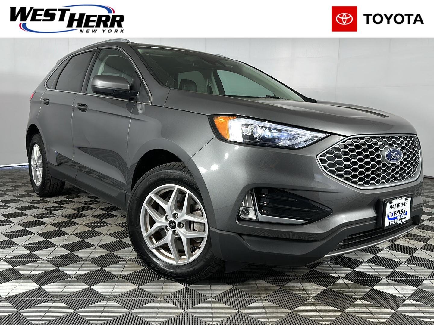 Used 2024 Carbonized Gray Ford SEL image 1