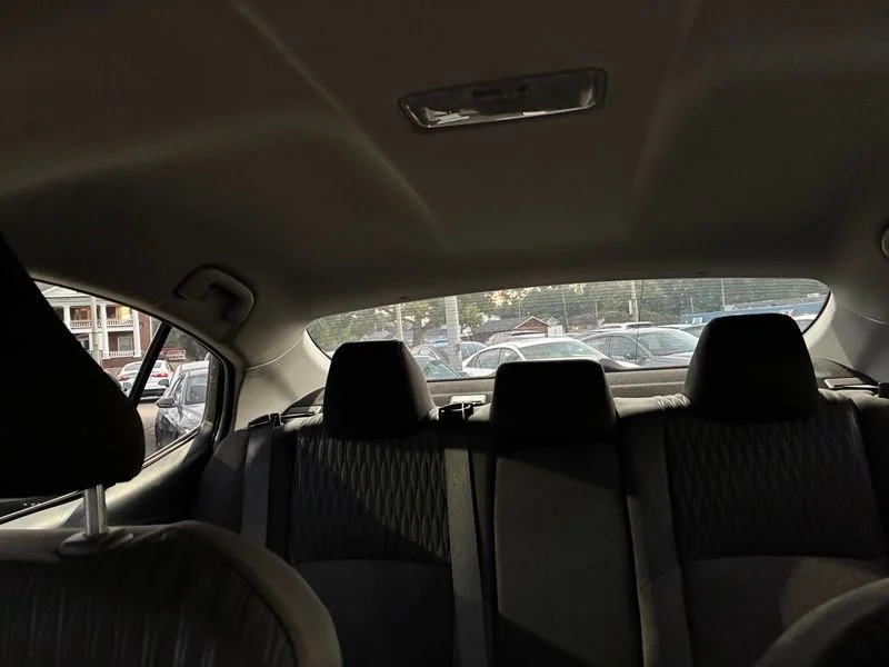 Used 2025 Black Toyota LE image 11