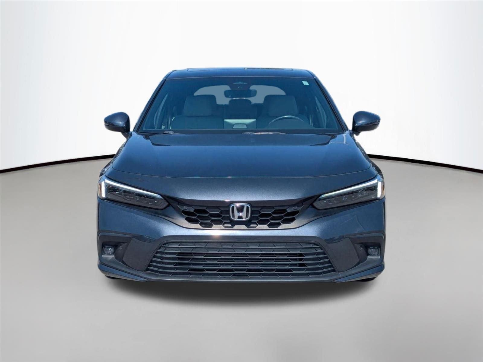 Used 2022 Meteorite Gray Metallic Honda Sport Touring image 1