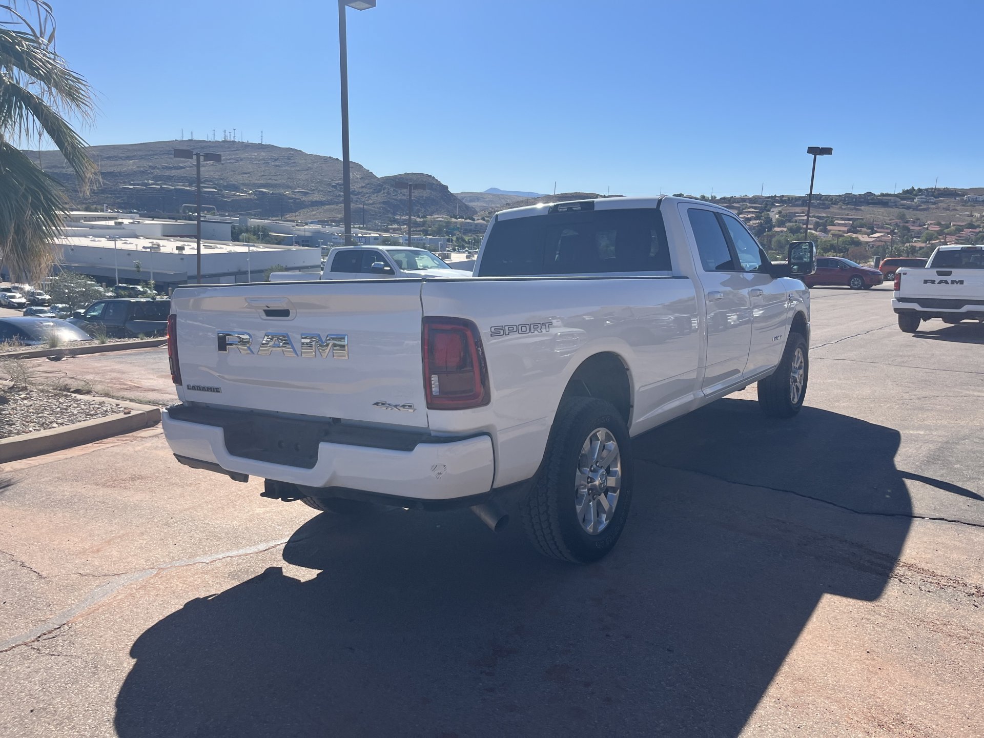 Used 2026 Bright White Clearcoat Ram Laramie image 1