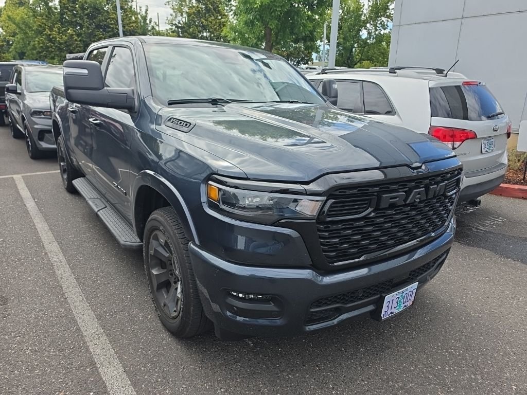 Certified Used 2025 Blue Metallic Ram Big Horn/Lone Star image 1