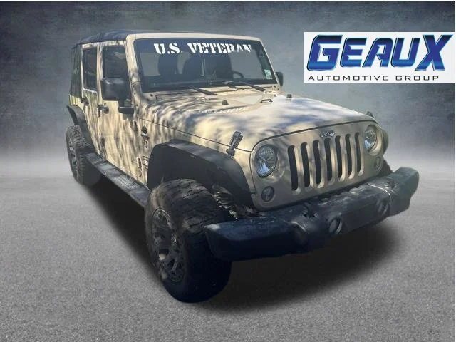 Used 2016 Tan Jeep Unlimited Sport image 1