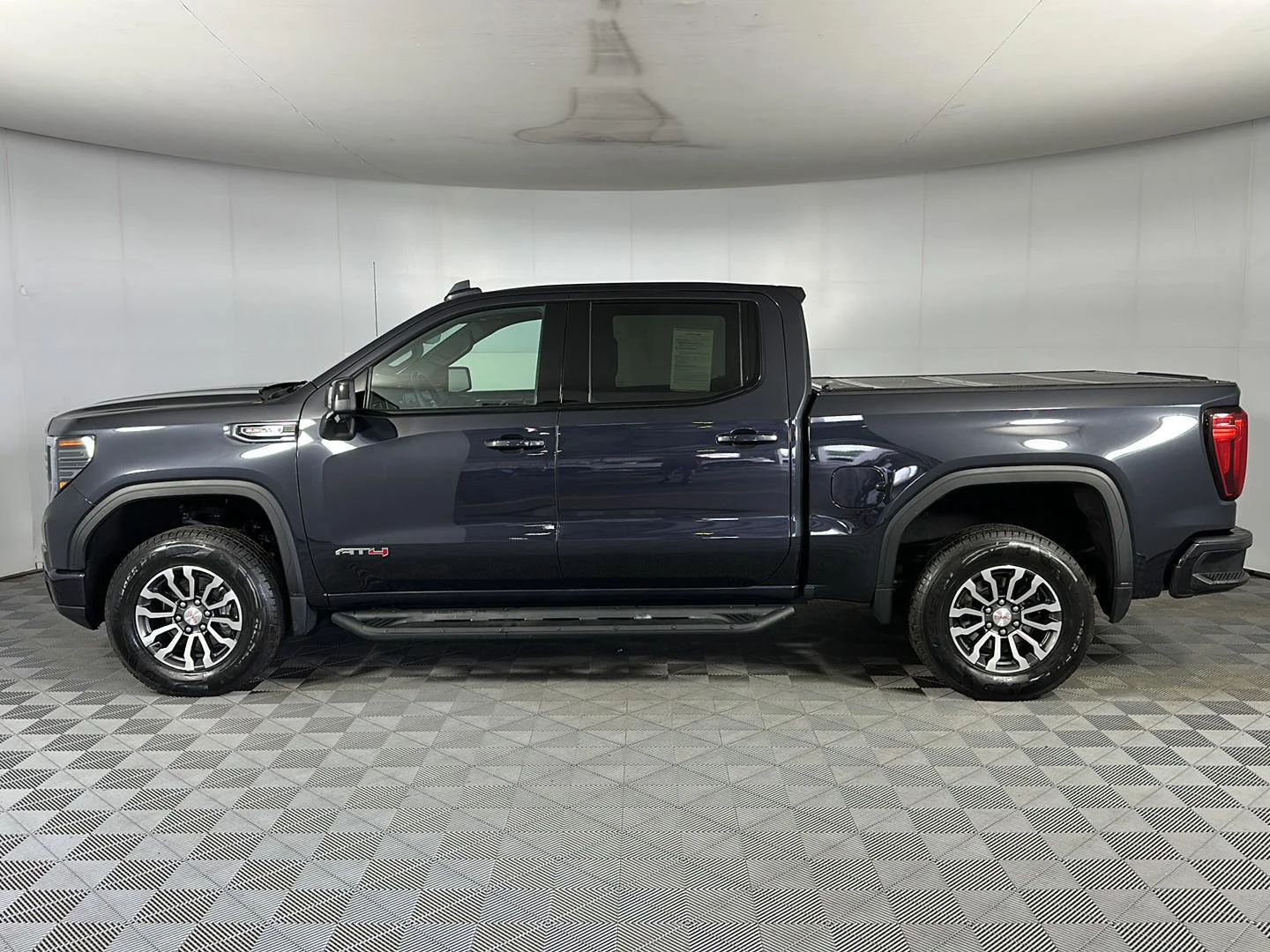 Used 2023 Titanium Rush Metallic GMC AT4 image 4