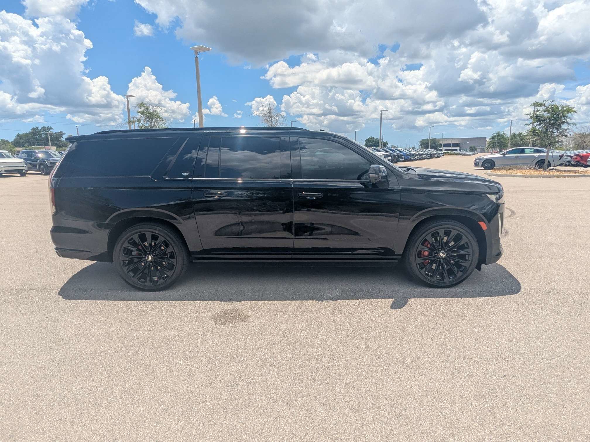 Used 2022 Black Raven Cadillac Sport image 4