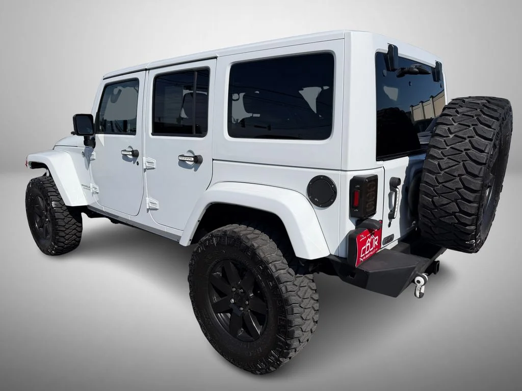 Used 2014 White Jeep Unlimited Sahara image 4