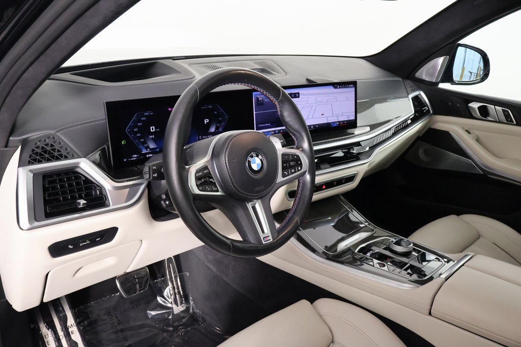 Certified Used 2024 Black Sapphire Metallic BMW M60i image 7