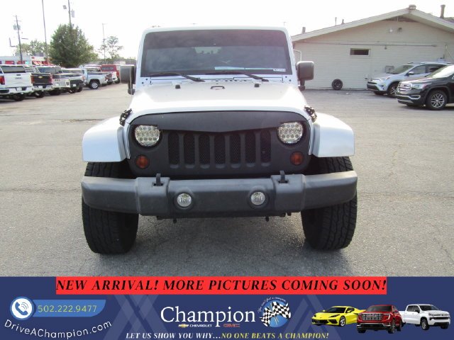 Used 2012 Silver Jeep Unlimited Sahara image 2