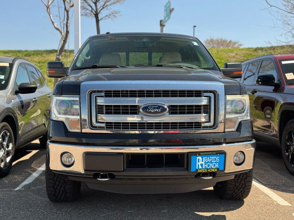 Used 2014 Ford F-150 XLT with VIN 1FTFW1ET6EKF24671 for sale in Coon Rapids, Minnesota