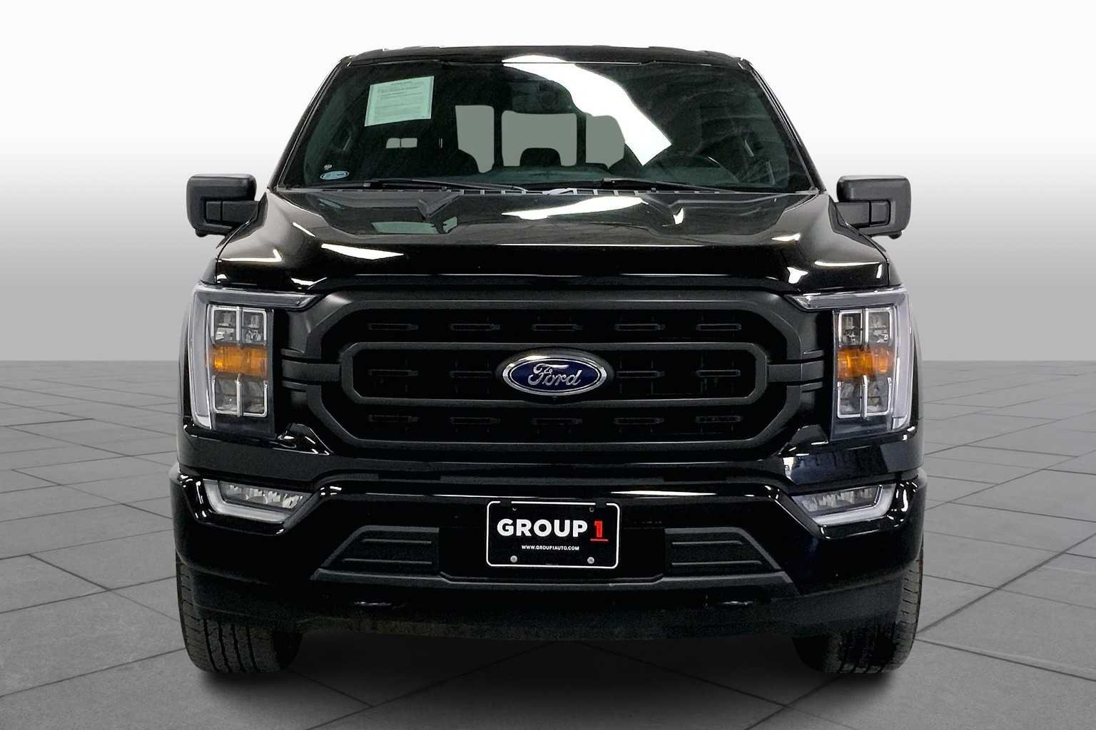 Used 2022 Agate Black Metallic Ford XLT image 4