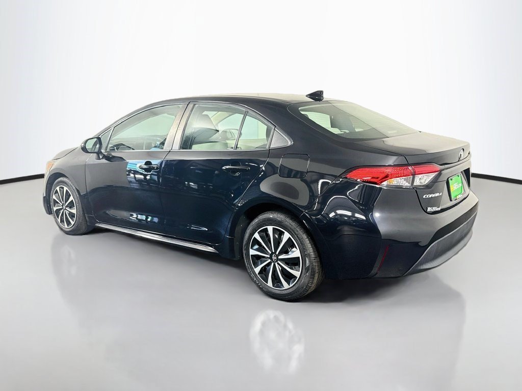 Used 2023 Midnight Black Metallic Toyota LE image 5