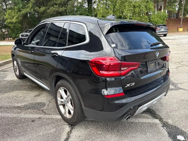 Used 2021 Black Sapphire Metallic BMW sDrive30i image 3