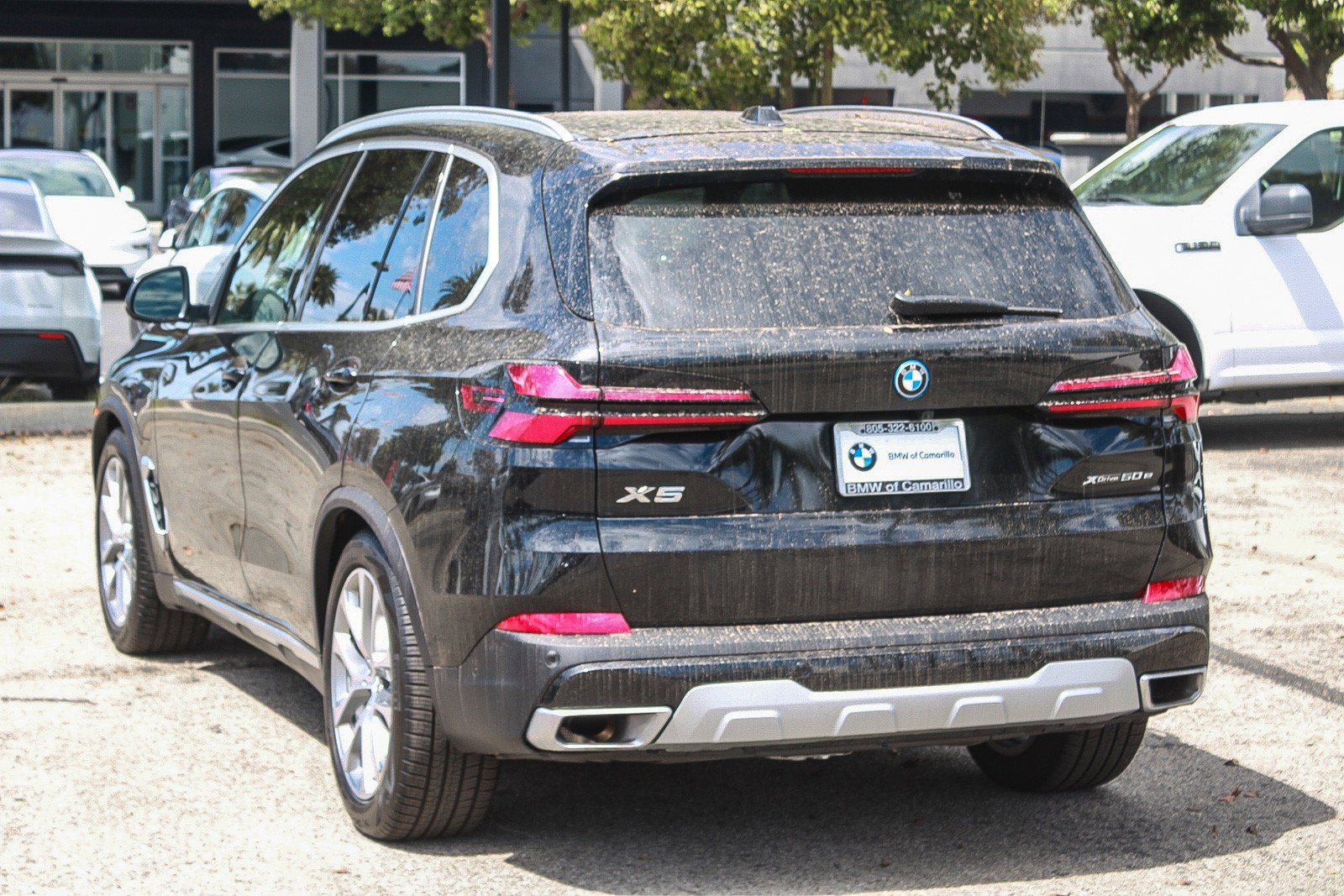 Used 2026 Black Sapphire Metallic BMW xDrive50e image 4