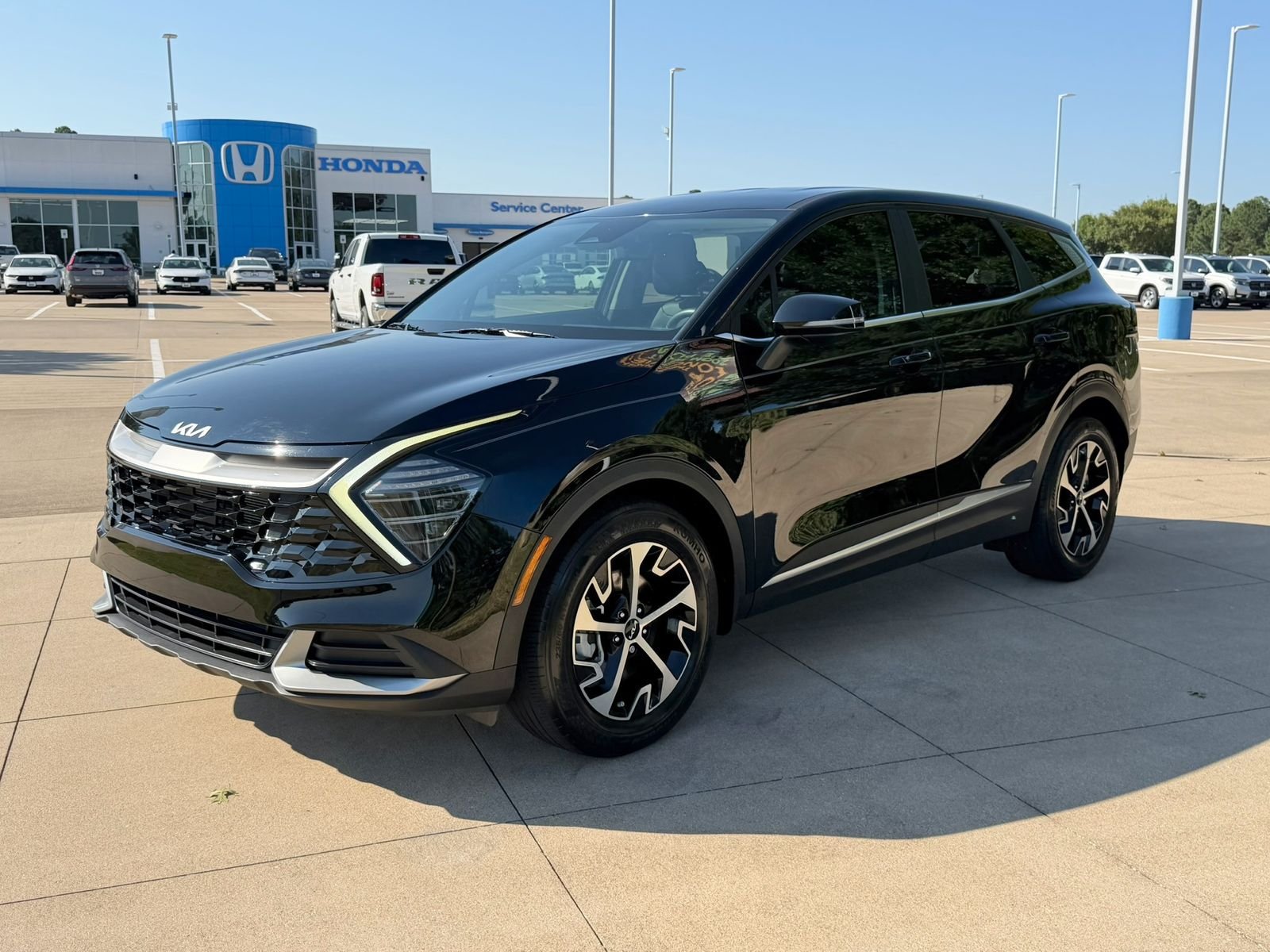 Used 2024 Ebony Black Kia EX image 3