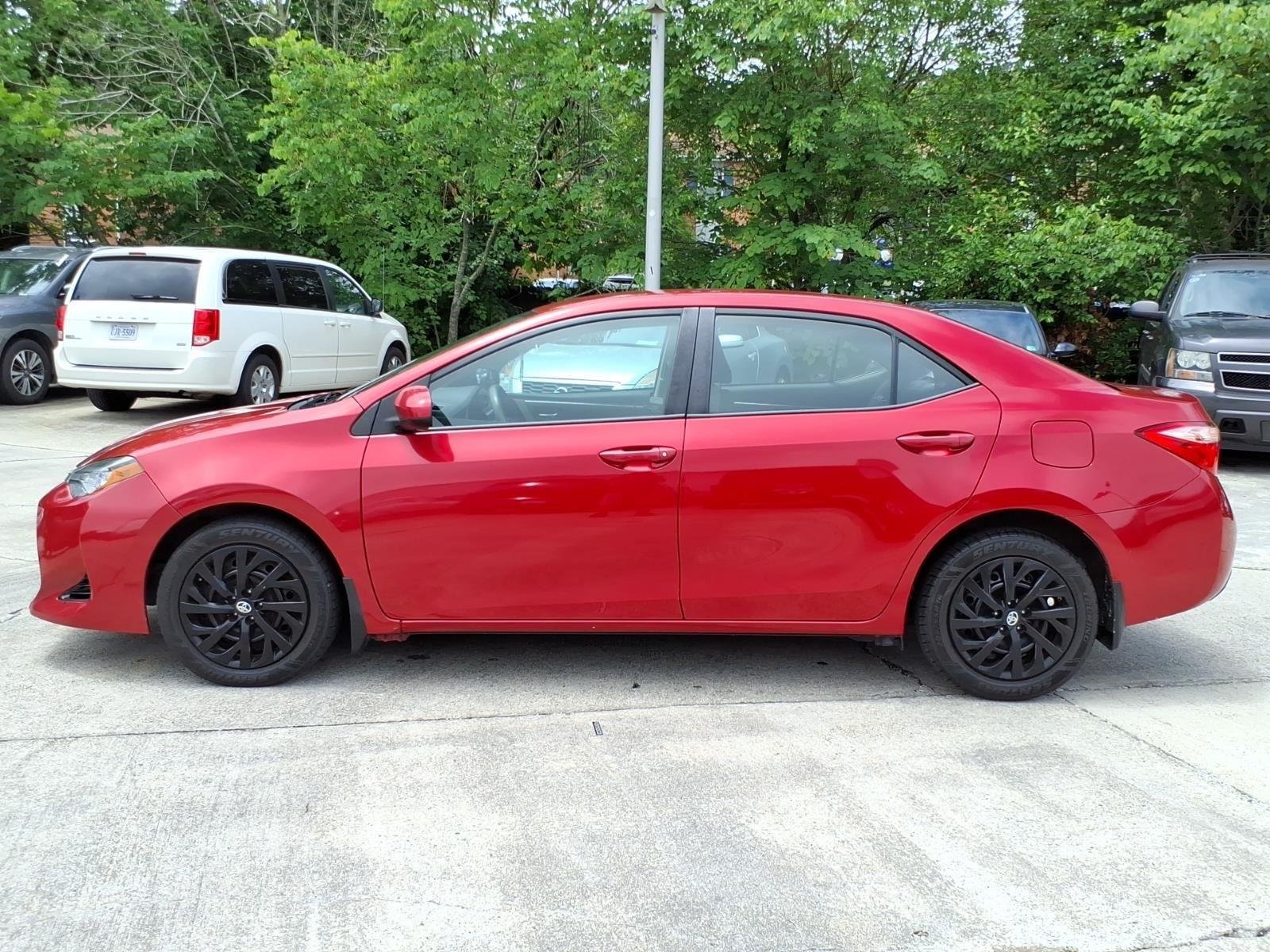 Used 2018 Barcelona Red Metallic Toyota LE image 4