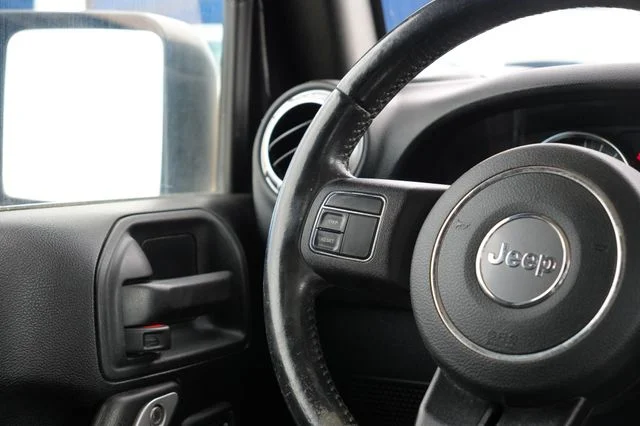 Used 2018 Black Jeep Unlimited Sahara image 18