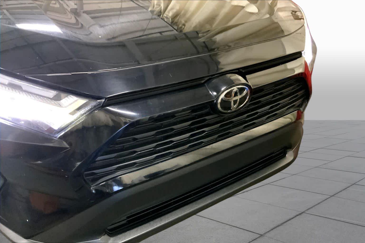 Used 2025 Midnight Black Metallic Toyota Hybrid LE image 30