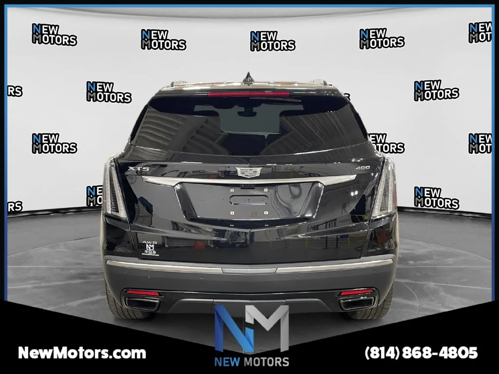 Used 2022 Black Metallic Cadillac Sport image 4