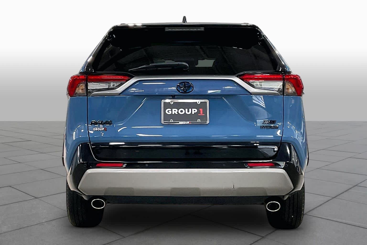 Used 2023 Cavalry Blue/Midnight Black Metallic Toyota Hybrid XSE image 4
