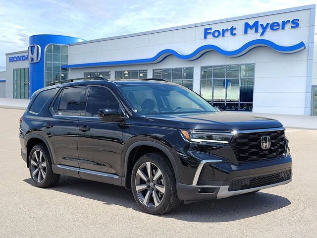 Used 2025 Crystal Black Pearl Honda Touring image 1