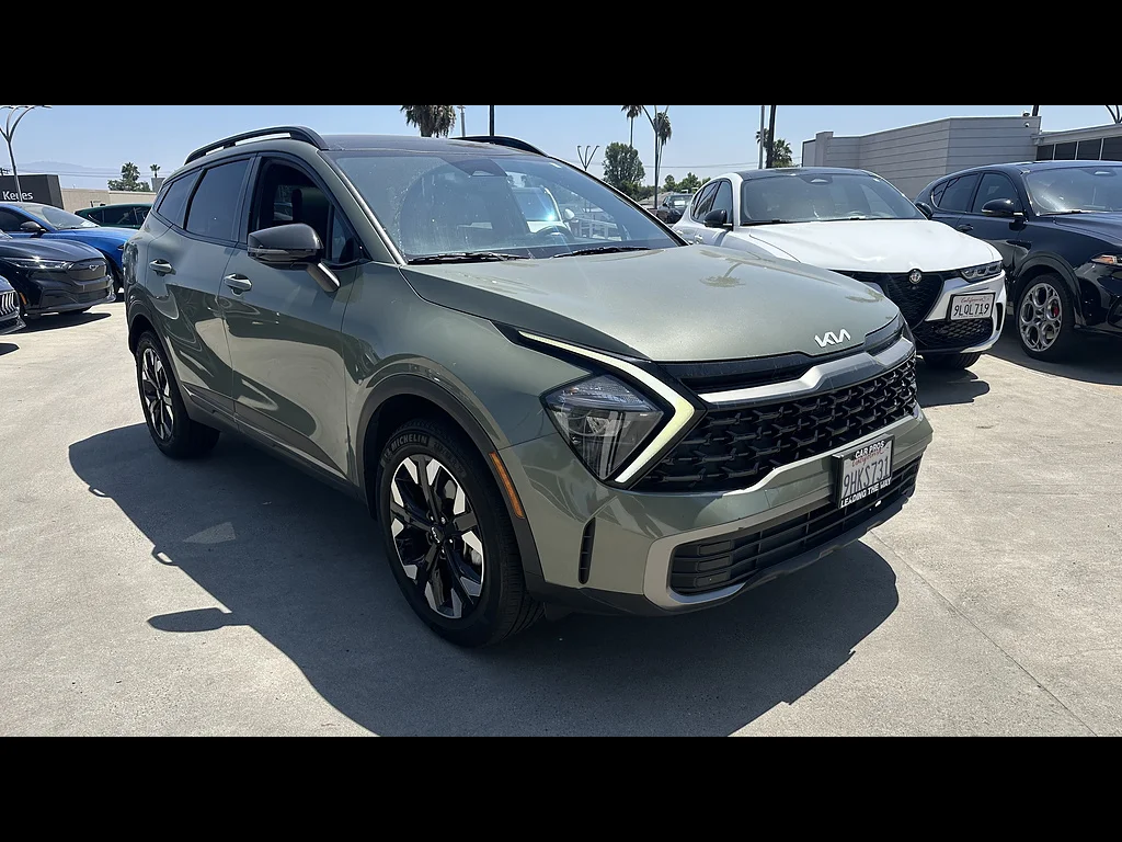Used 2023 Jungle Green Kia X-Line image 1