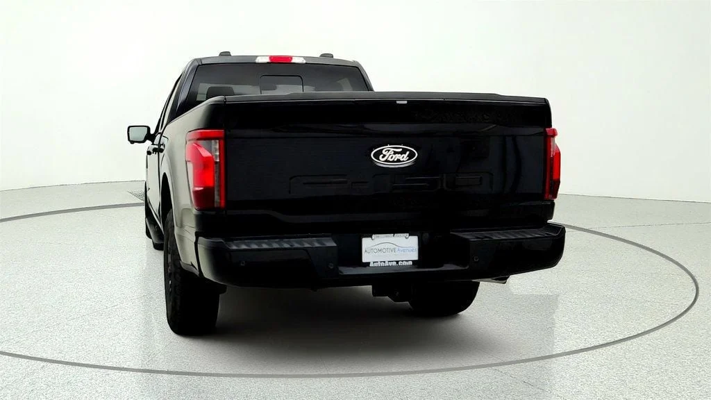 Used 2025 Agate Black Metallic Ford XLT 4WD SuperCrew 5.5