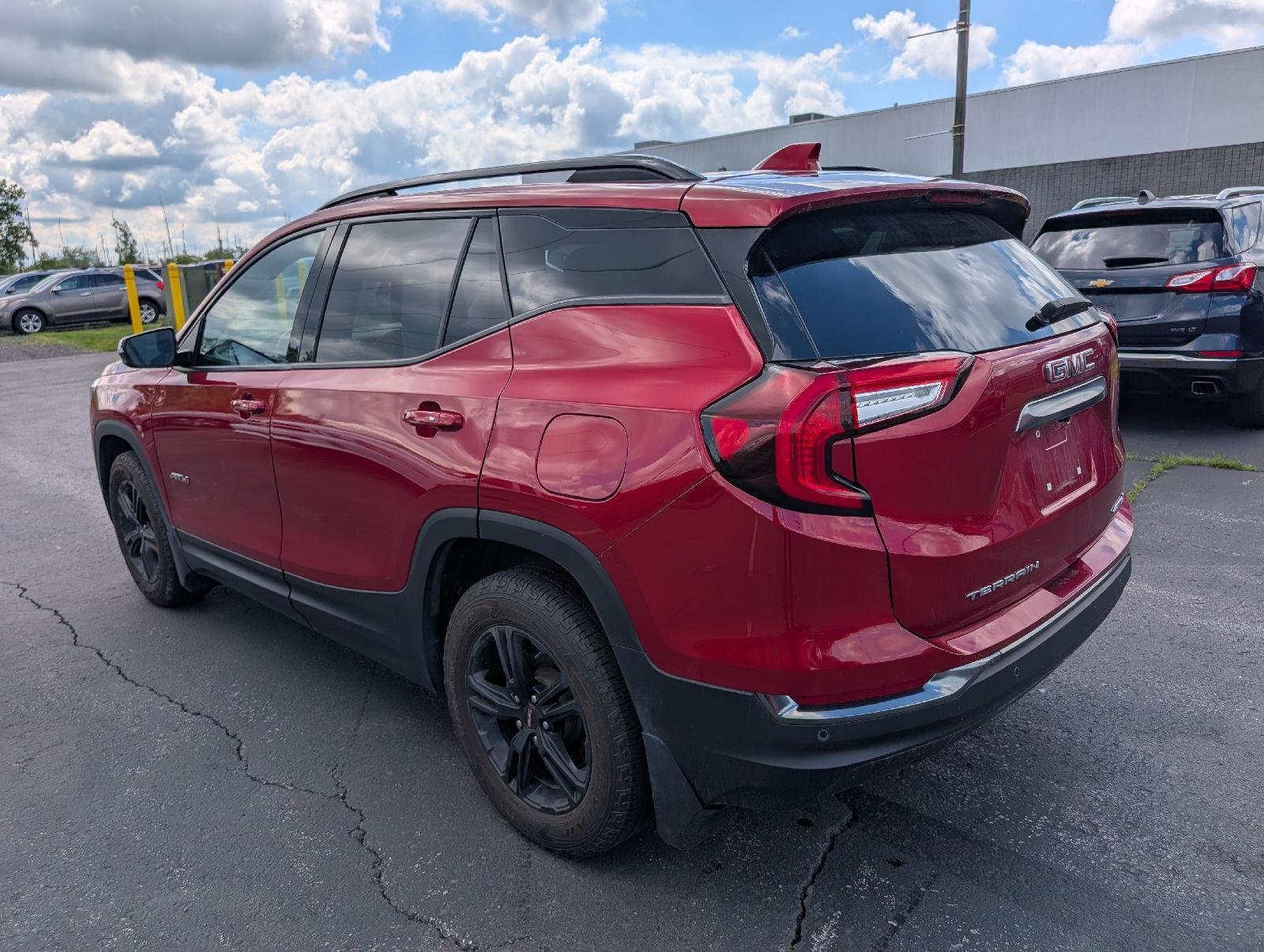 Used 2024 Volcanic Red Tintcoat GMC AT4 image 5