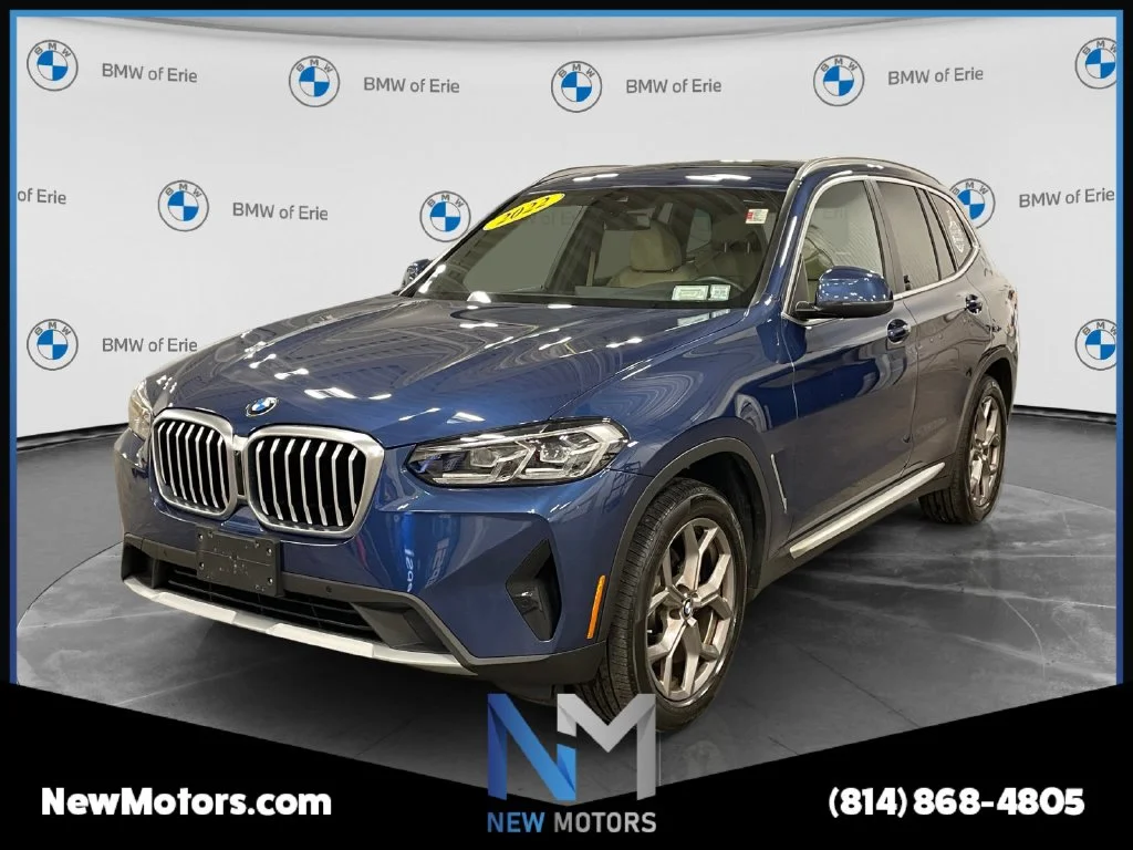 Used 2022 Blue Metallic BMW xDrive30i image 1