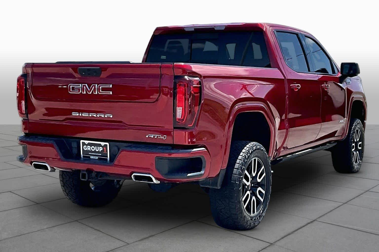 Used 2023 Volcanic Red Tintcoat GMC AT4 image 13