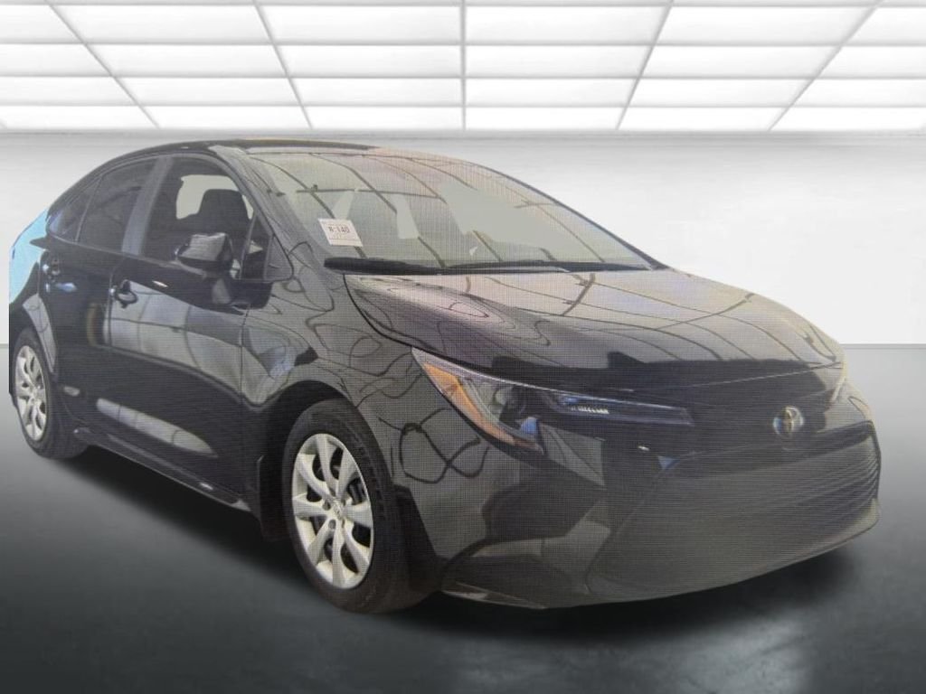 Used 2025 Black Toyota LE image 1