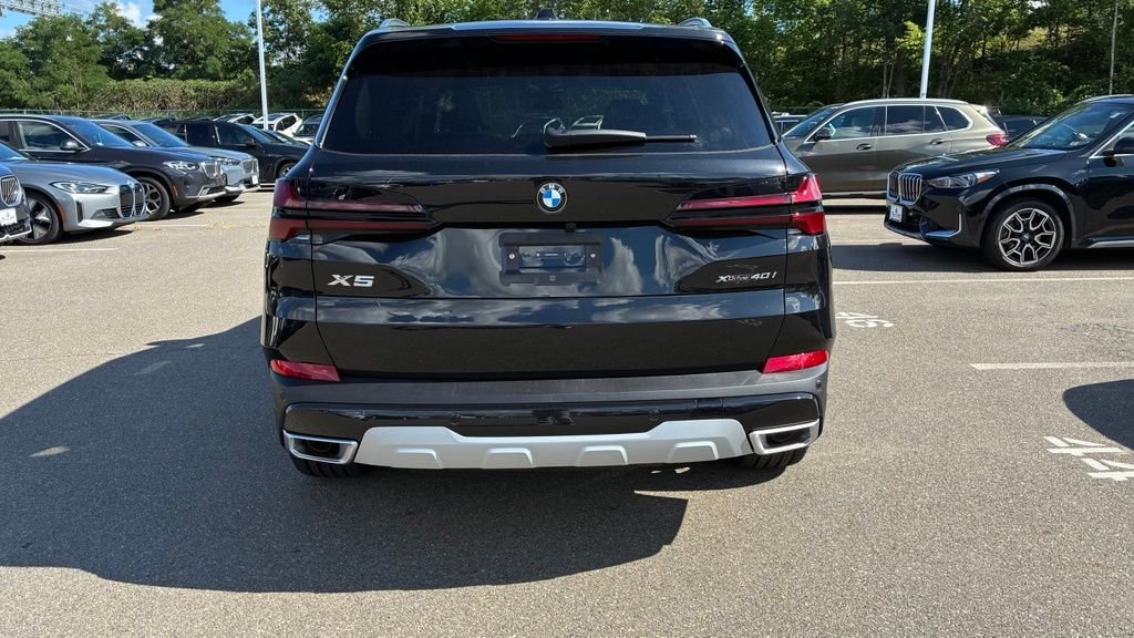 New 2026 Black Sapphire Metallic BMW xDrive40i image 4