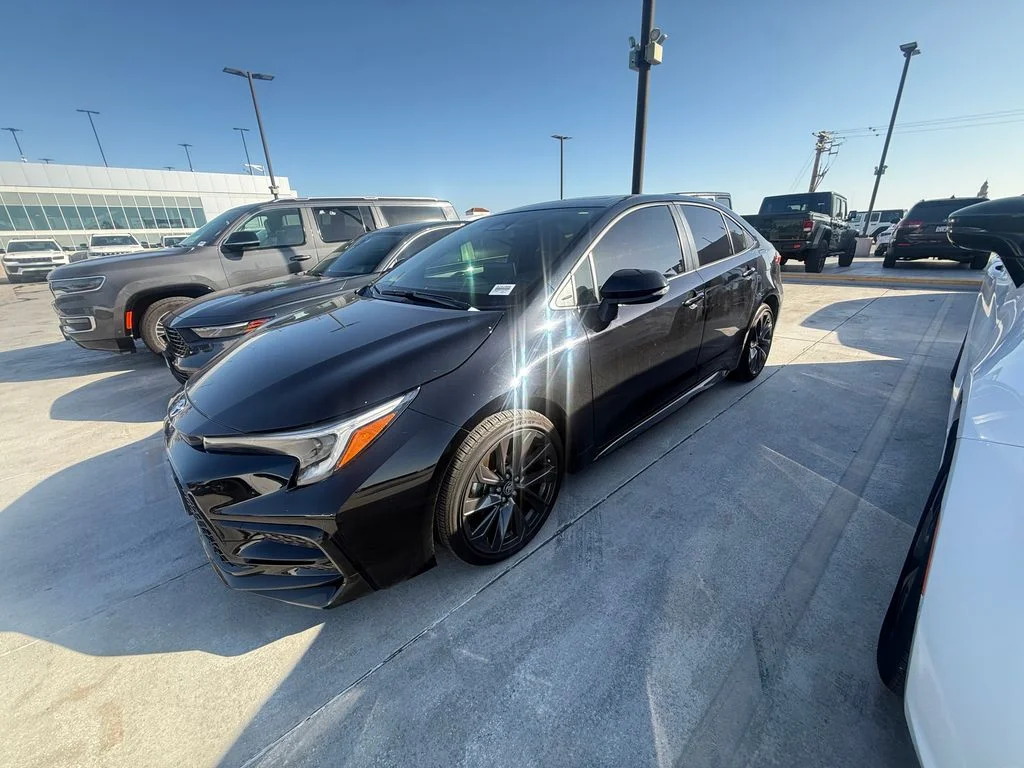 Used 2025 Black Toyota SE image 1