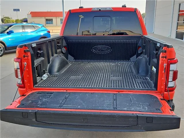 Used 2023 Orange Ford Raptor 4x4 SuperCrew Cab 5.5 ft. box 145 in. WB image 9