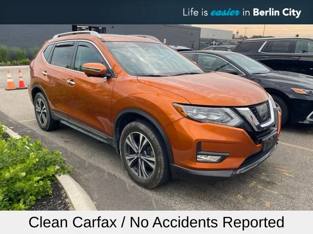 Used 2017 Orange Nissan SL image 1