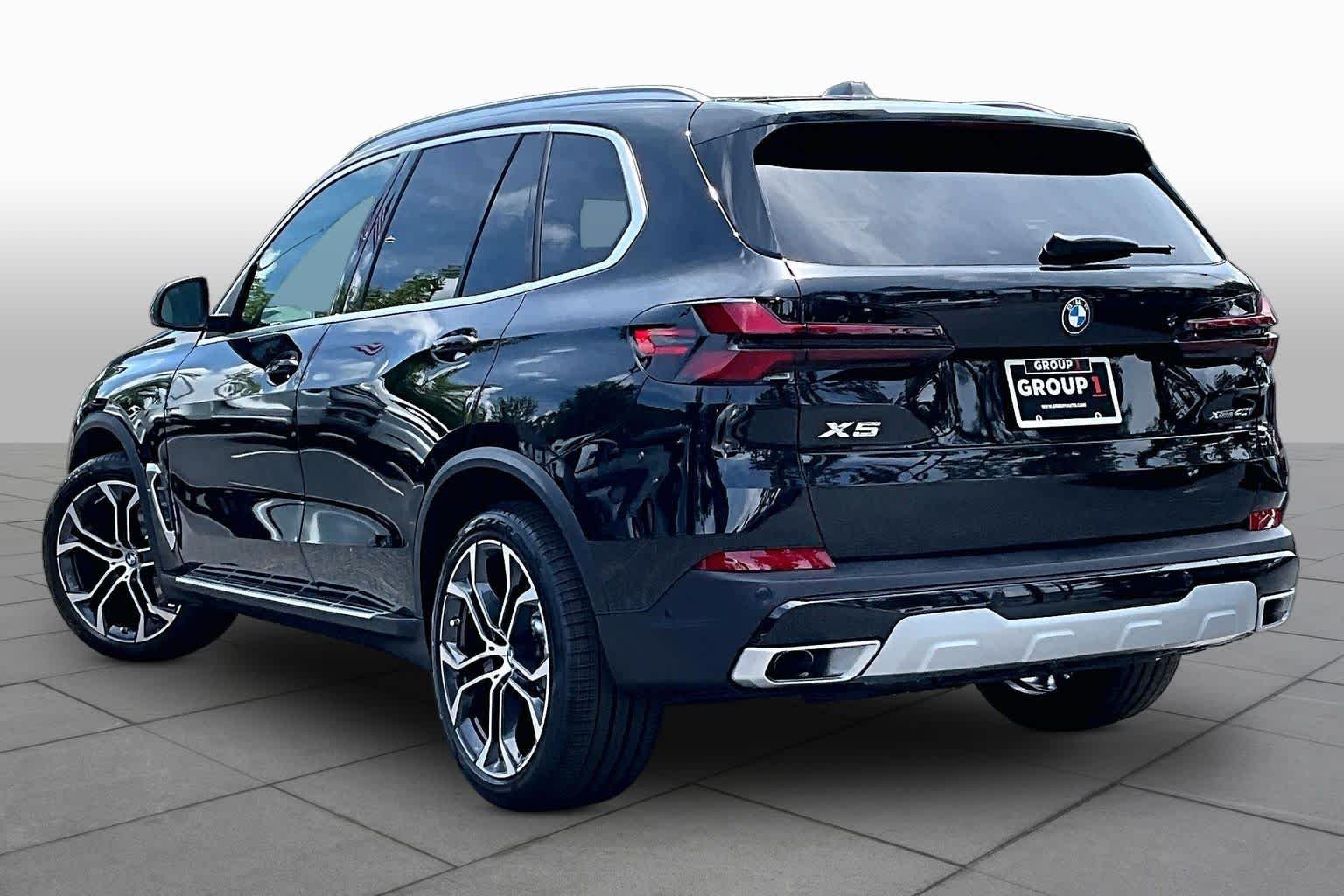 New 2026 Black Sapphire Metallic BMW xDrive40i image 12