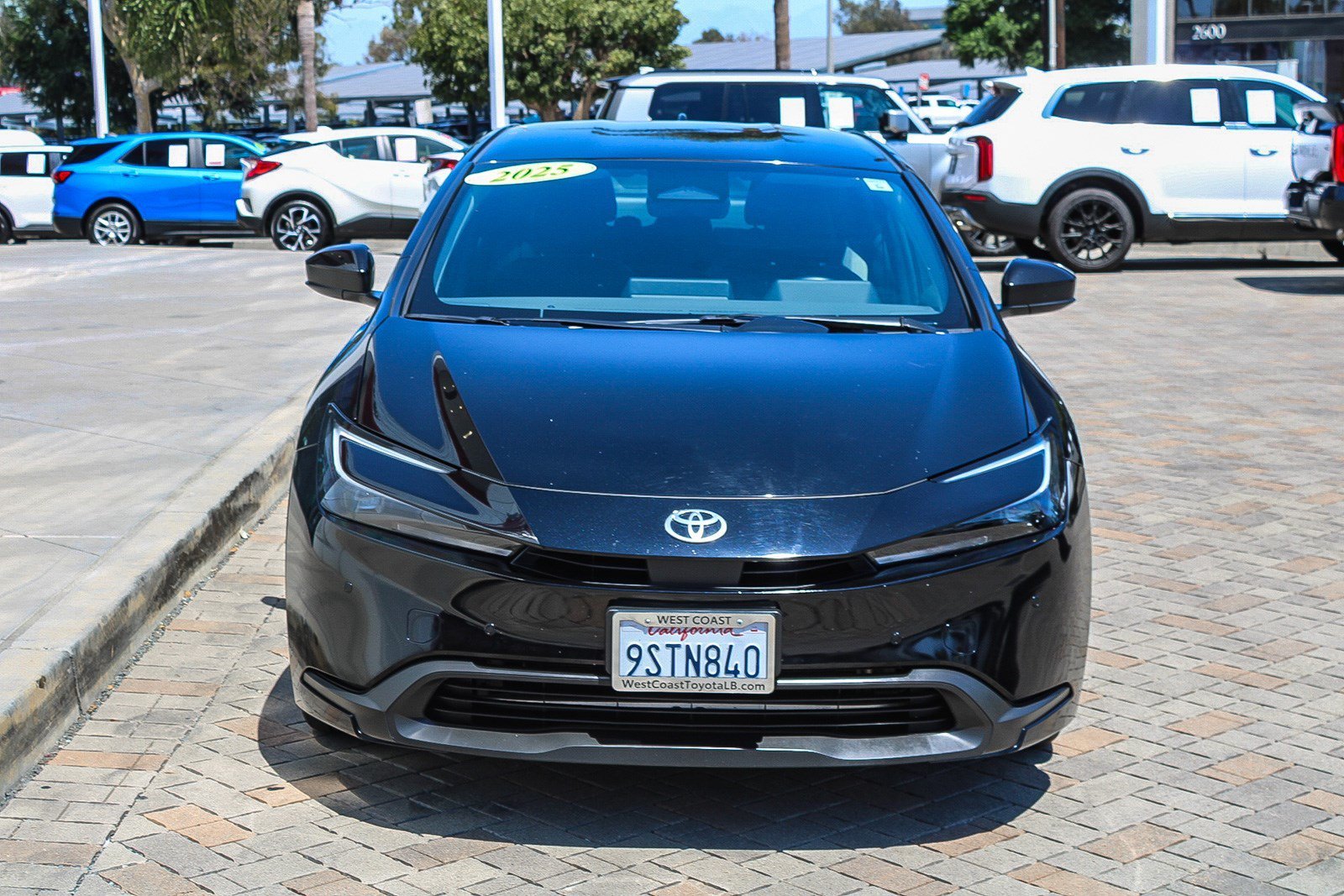 Certified Used 2025 Midnight Black Metallic Toyota LE image 2