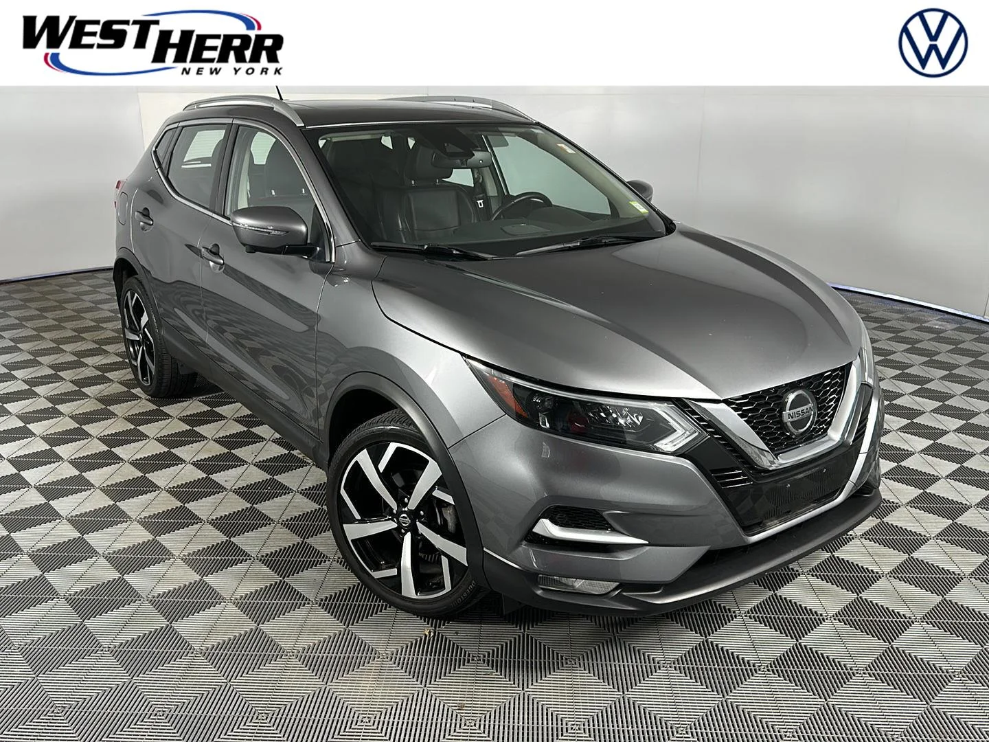 Used 2022 Gun Metallic Nissan SL image 1