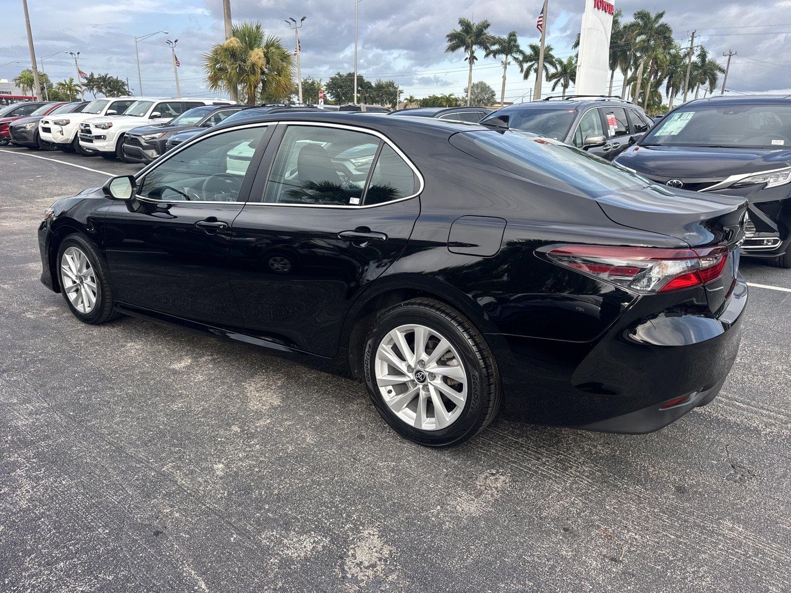 Used 2024 Midnight Black Metallic Toyota LE image 6