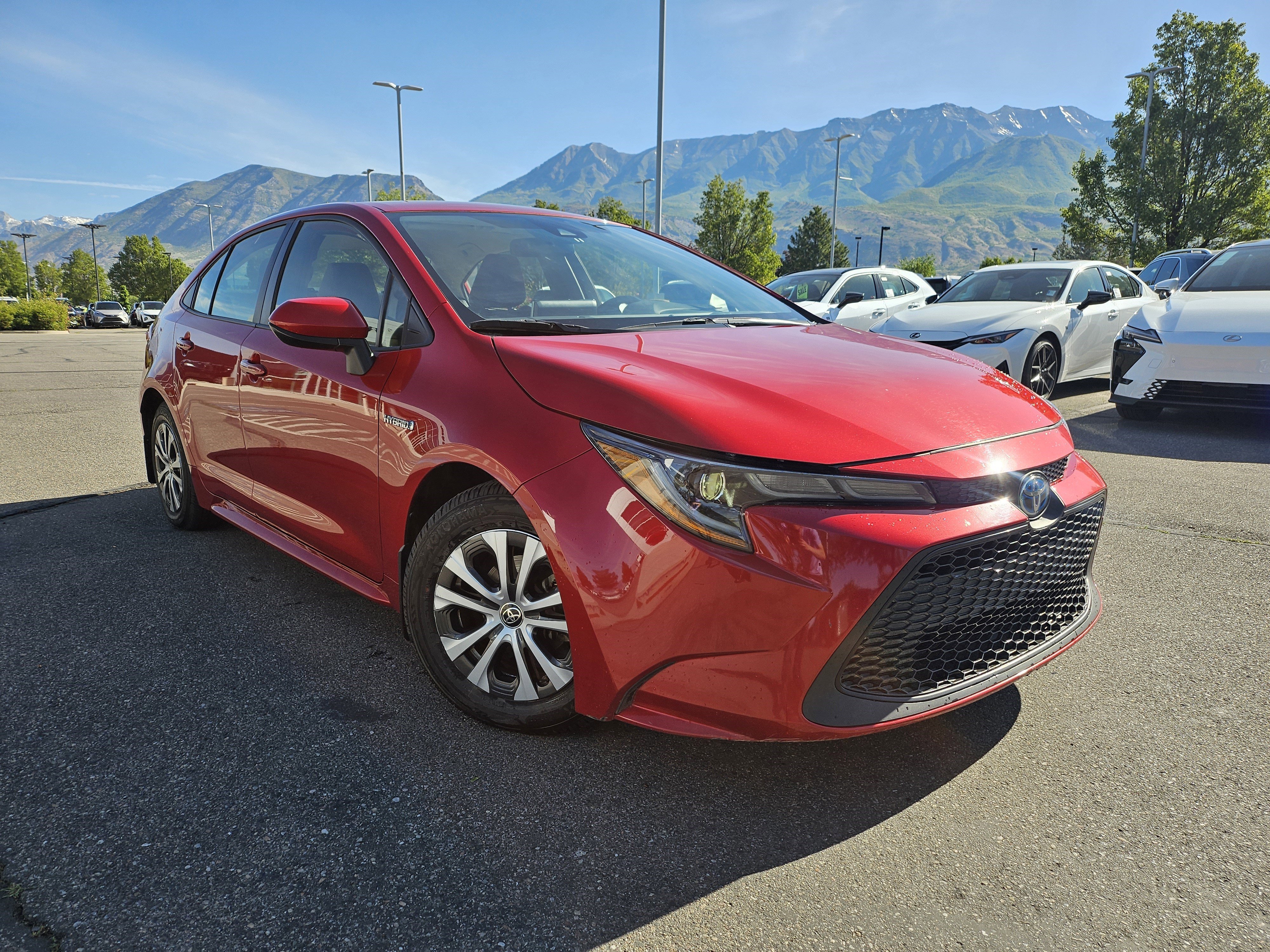 Used 2021 Barcelona Red Metallic Toyota LE image 3