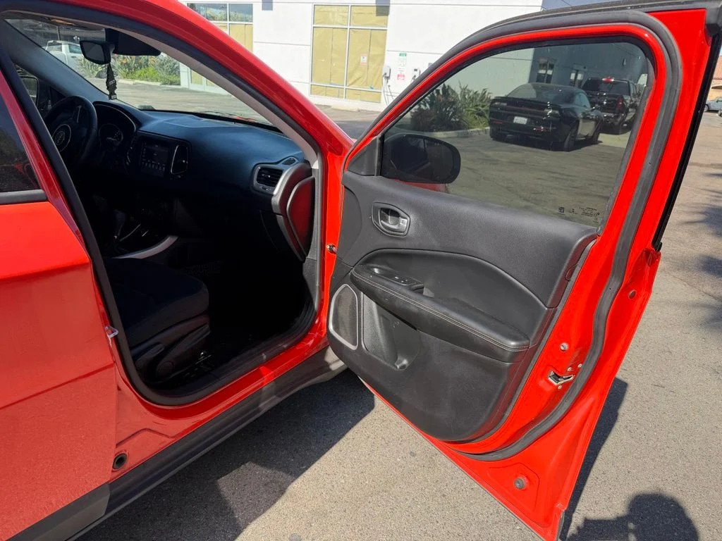 Used 2018 Orange Jeep Sport image 14