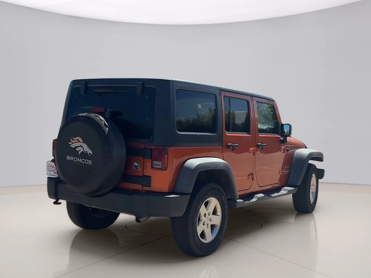Used 2011 Orange Jeep UNLIMITED image 5