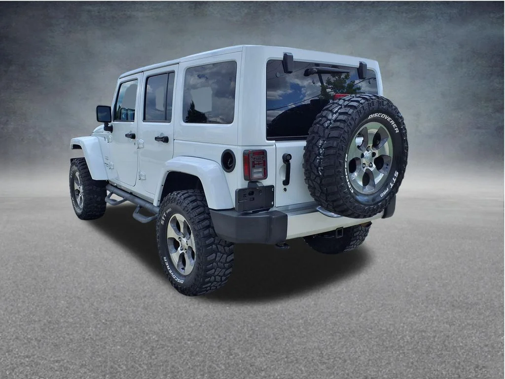 Used 2016 White Jeep Unlimited Sahara image 6