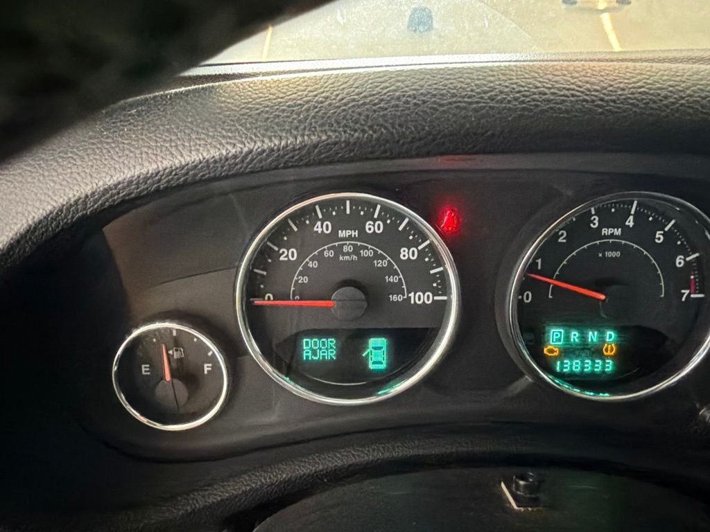 Used 2012 Silver Jeep Unlimited Sahara image 10