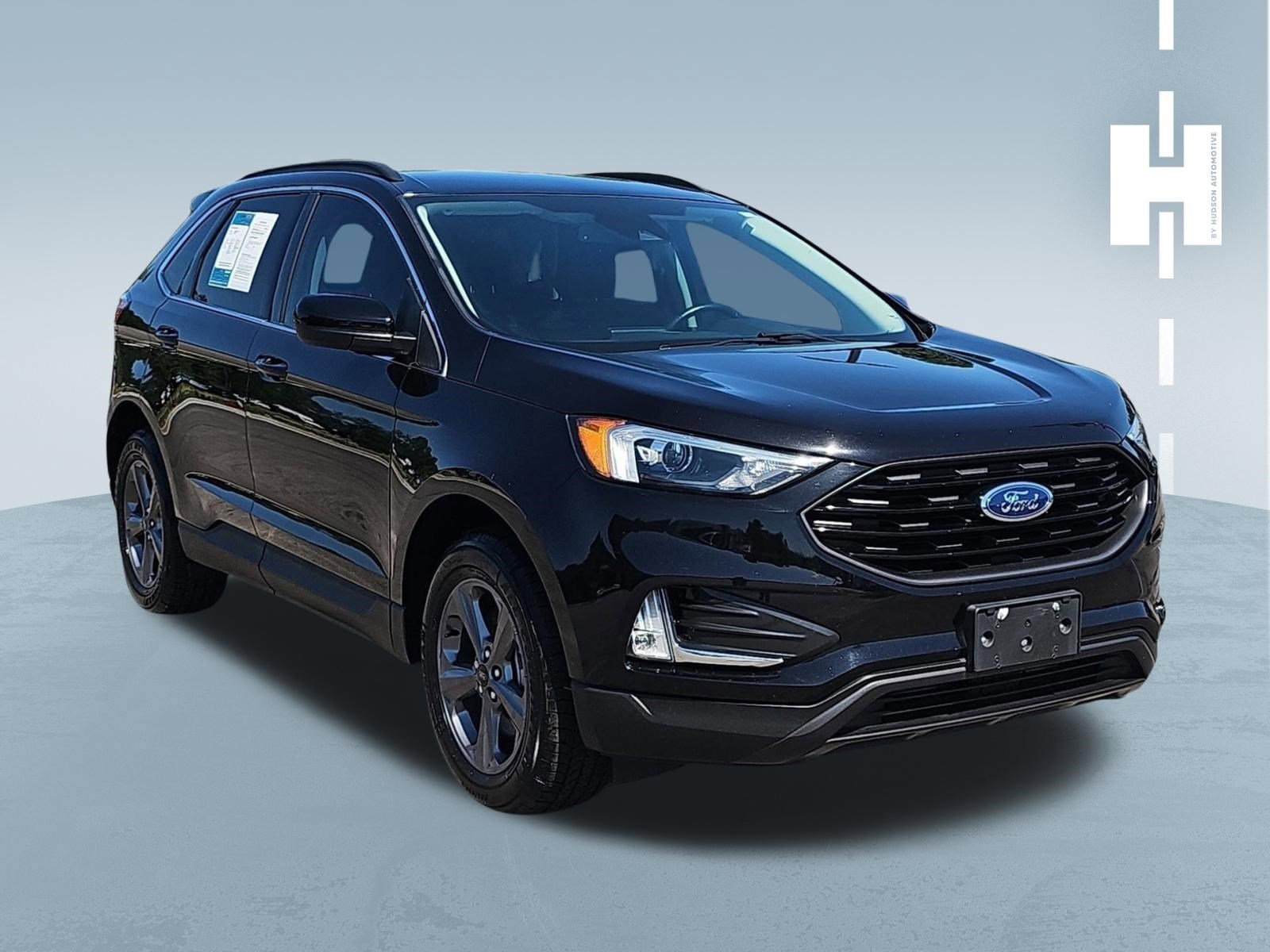 Used 2022 Black Metallic Ford SEL image 1