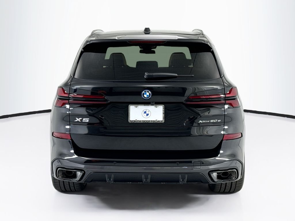 New 2026 Black Sapphire Metallic BMW xDrive50e image 6