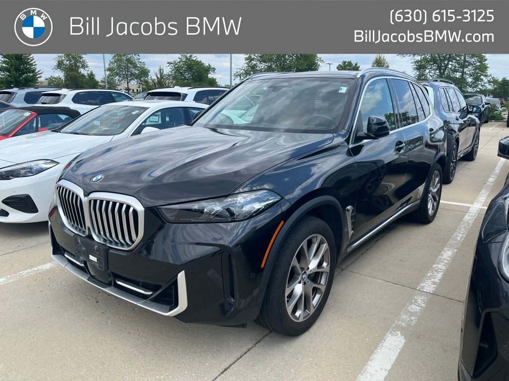 Certified Used 2024 Black Sapphire Metallic BMW xDrive40i image 1