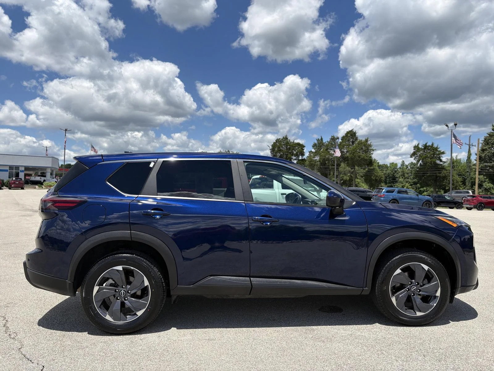 Used 2025 Deep Ocean Blue Pearl Nissan SV image 23