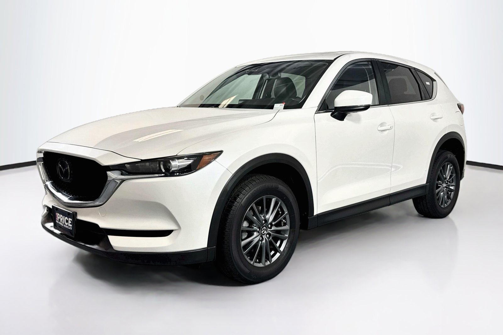 Used 2019 Snowflake White Pearl Mica Mazda Touring image 1